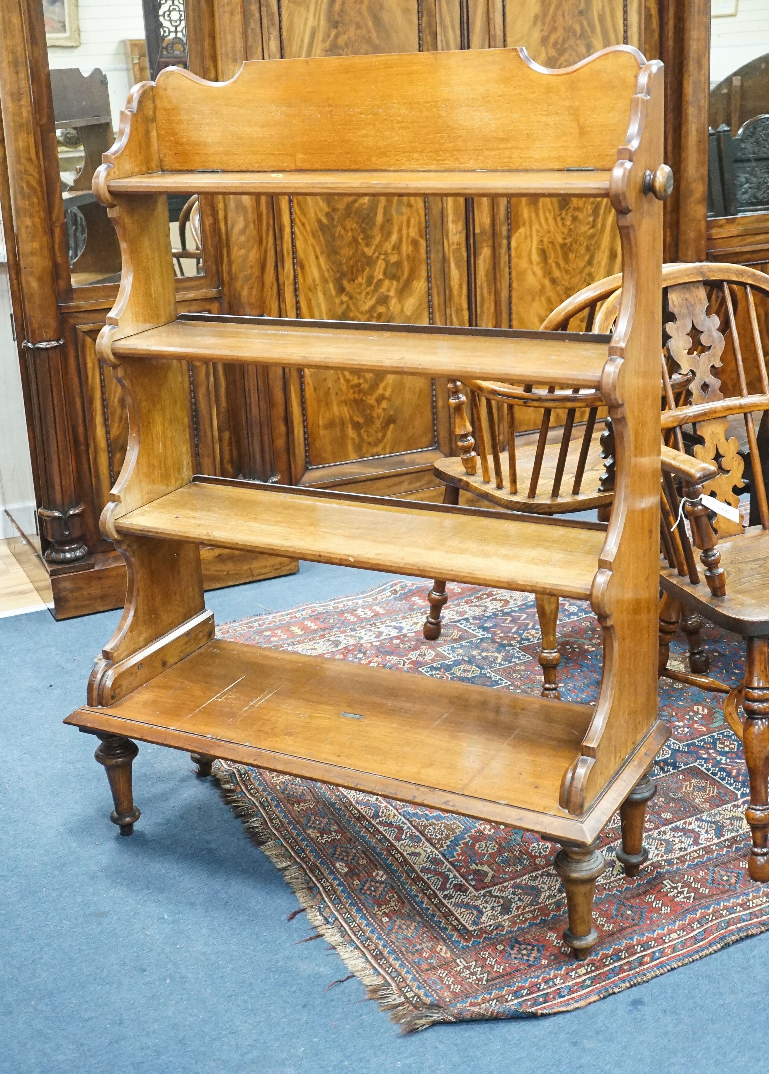 A late 19th century mahogany campaign four tier open bookcase by Ross and Co. Dublin, width 98cm, depth 37cm, height 133cm